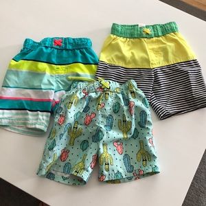 Set of 3 toddler boy swimsuits. Size 5t